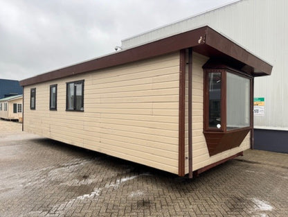 ** Canexel chalet 10 x 4 2 slaapkamers ideaal voor de handyman 7950,-**